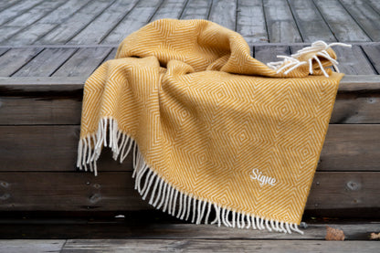 Personlige ullpledd fra Spinnerigården