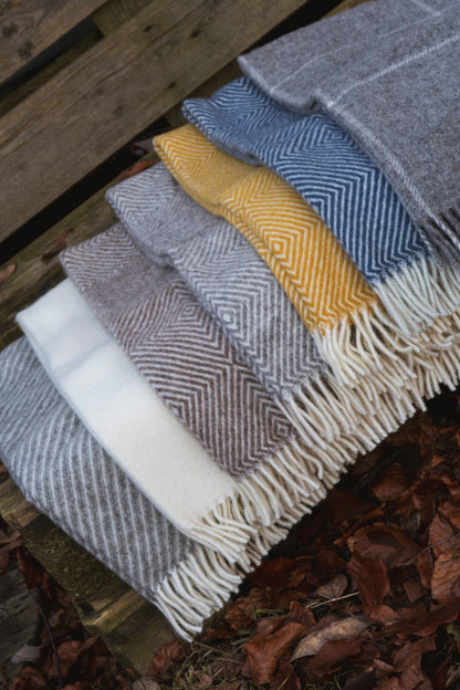 Personlige ullpledd fra Spinnerigården